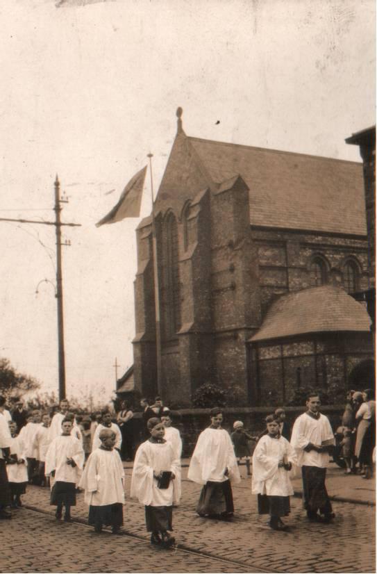 St Mary's Choir passing the church