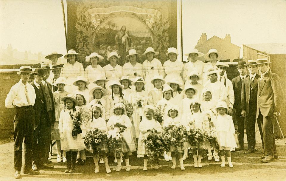 Taken same location as previous photo, Margaret and Ellen Ryan are on the back row.