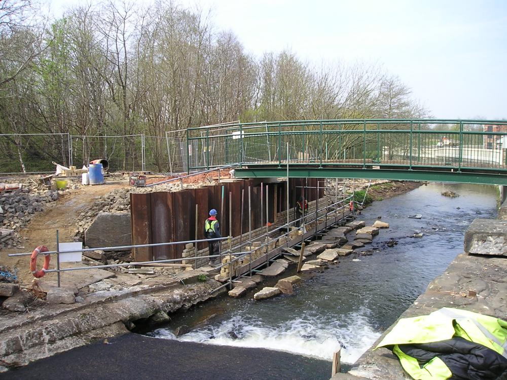 22-04-2008- Stone cladding works to the footbridge.