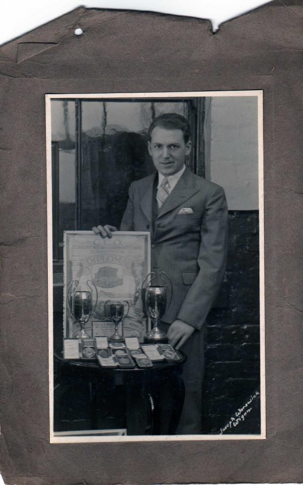 Dad with his medals and cups he won  JamesEdwards