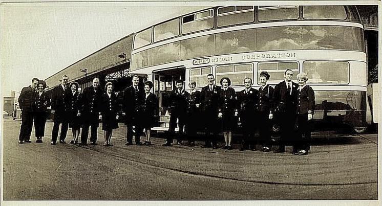 1965 Married couples working together on the buses