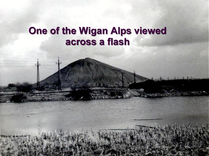 One of the Wigan Alps viewed across a flash.