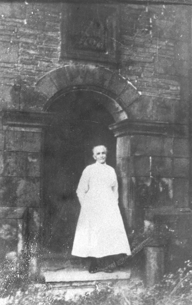 Lady stood in the doorway of Newgate House