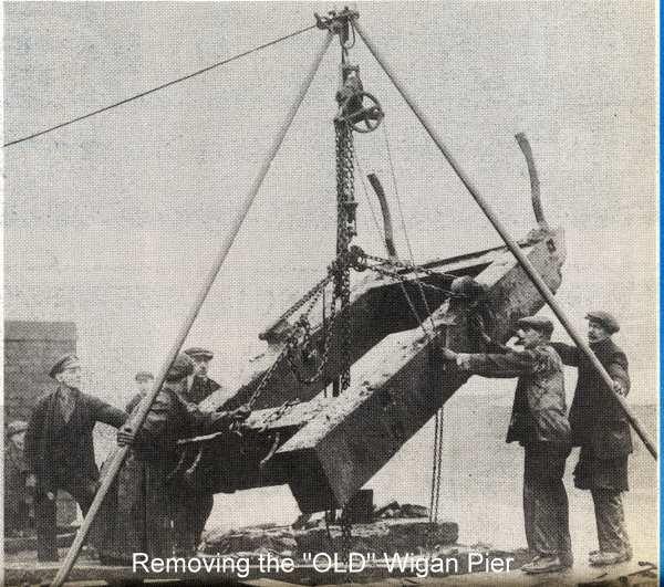 Dismantling the original Wigan Pier.