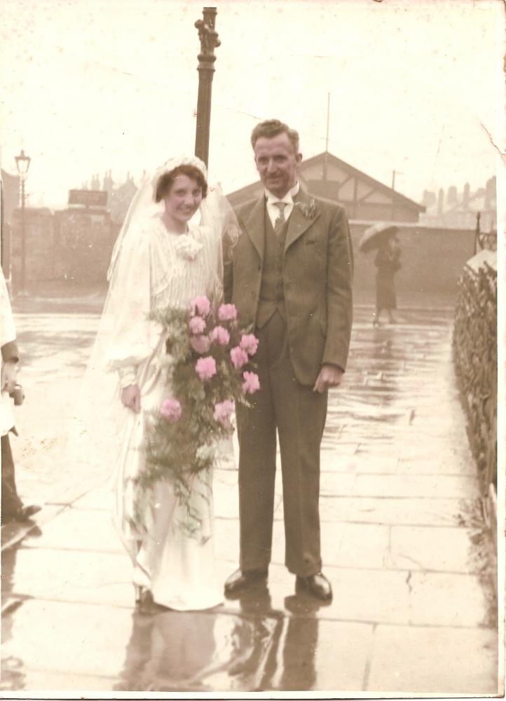 Evelyn Hallmark with her father John at St Michaels Church, Swinley. 1940