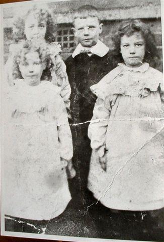 Joseph Marsh with his 3 sisters, Mary, Agnes and Ann. c1910.