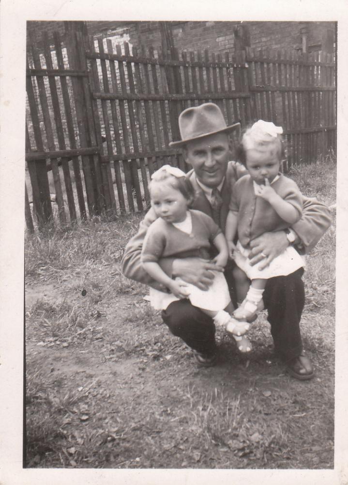 George Wall - proud father with his twin daughters.Approx 1951