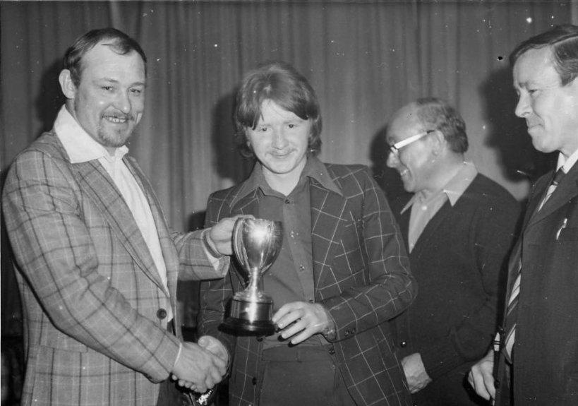 Jimmy Seddon recieving an award from Ray Martland the Wigan hooker.