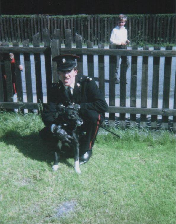 Ken in Church Lads Brigade uniform with dog Kim.