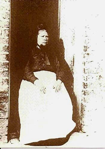 Wigan woman sat in doorway