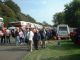 The long row of buses and the crowds. (77K)