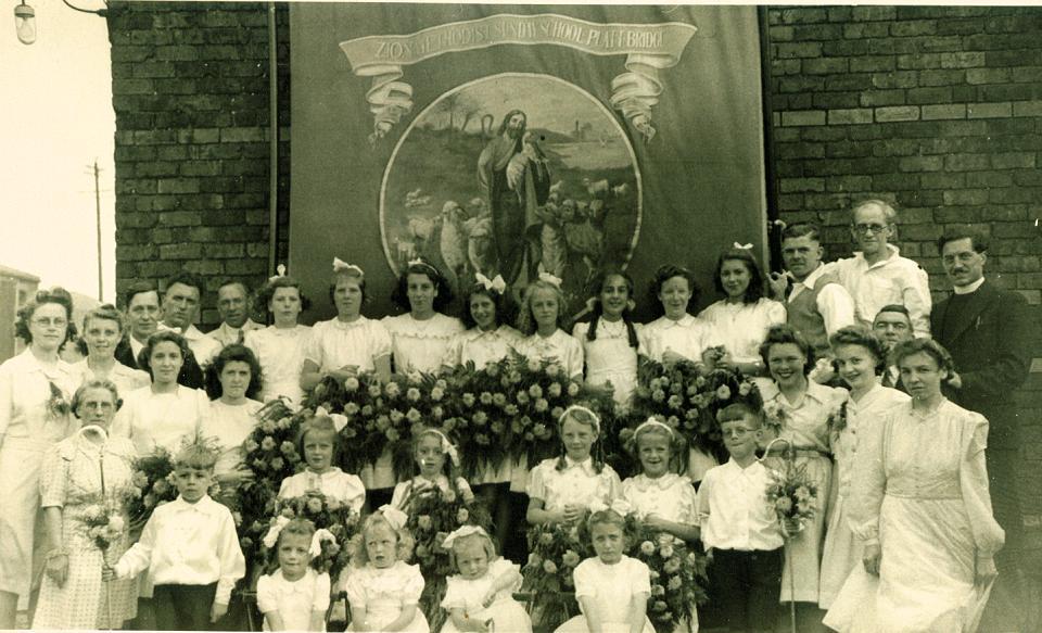 Rev. Dagg in collar, above him, Mr. Milner, back row of girls, 2nd. From right back, Audrey Monks, Margaret, last man on right John Howarth.