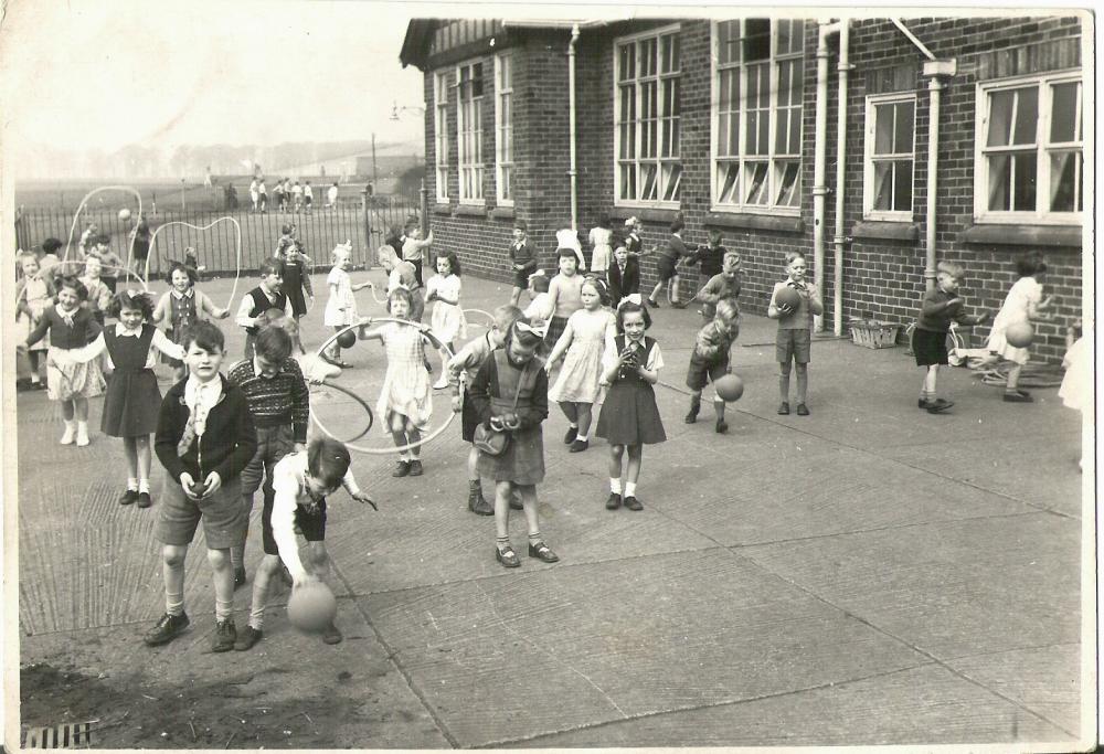 Golborne infants playing out 1956. Golborne infants playing out 1956.