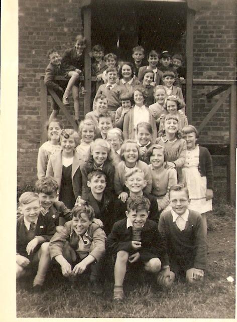 school photo (standard 5) outside parish room steps