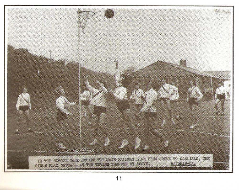 Net ball game in school yard.