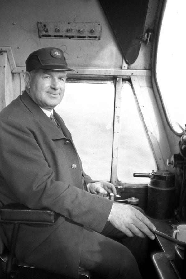 Driver Bill Stubbs at the controls of a Class 40, 1972. Driver Bill Stubbs at the controls of a Class 40, 1972.