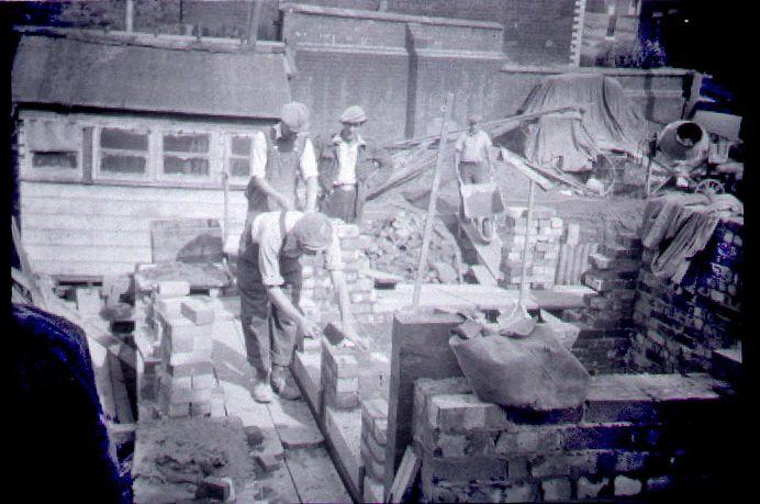 Work well under way in re-building the Crispin Arms, 1955.