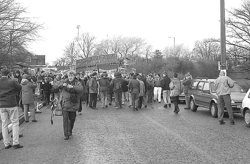 Marching up the pit lane.