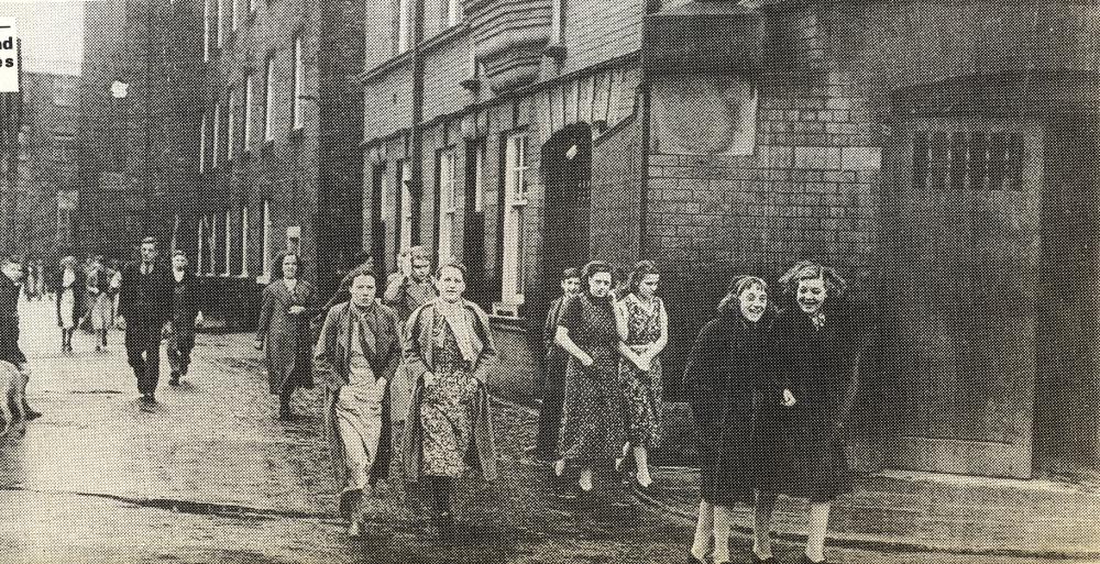 Workers head for home after their shift