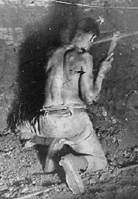 Miner hewing coal. Miner hewing coal.