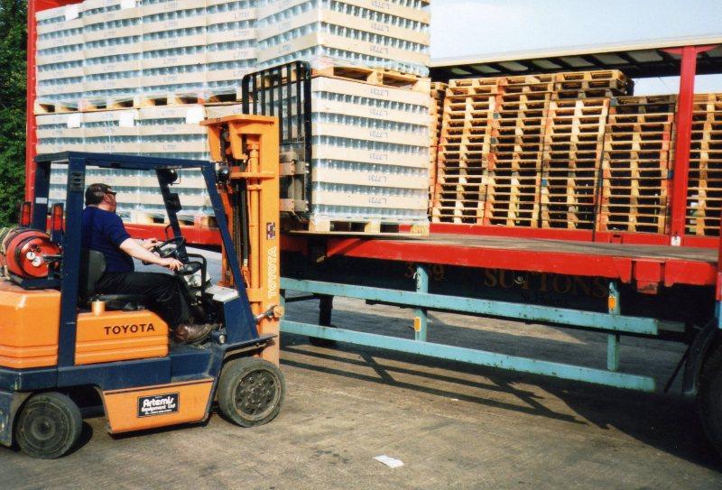 Loading a wagon in yard