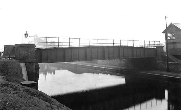 Wigan Central railway line crossing L & L canal Wigan Central railway line crossing L & L canal