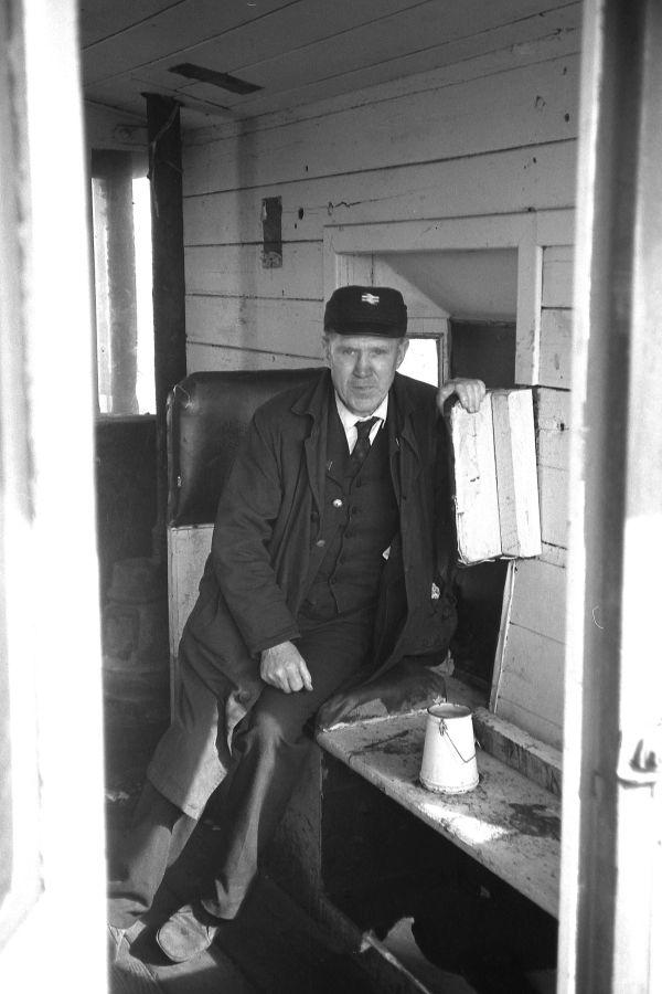 Springs Branch guard, Tommy Fagan in his brake van, July 1977.