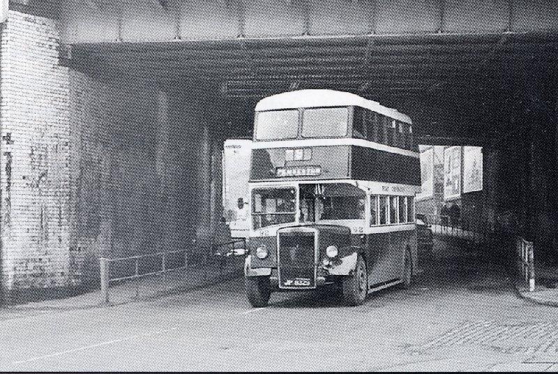 Pembeton Bus passes under Wallgate Bridge