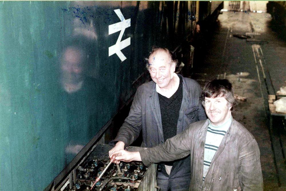 Harry Cherrington and Eddie McDermott checking batteries