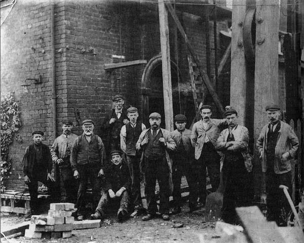 Colliers at the Pithead, Pewfall Colliery, Ashton in Makerfield. Colliers at the Pithead, Pewfall Colliery, Ashton in Makerfield.