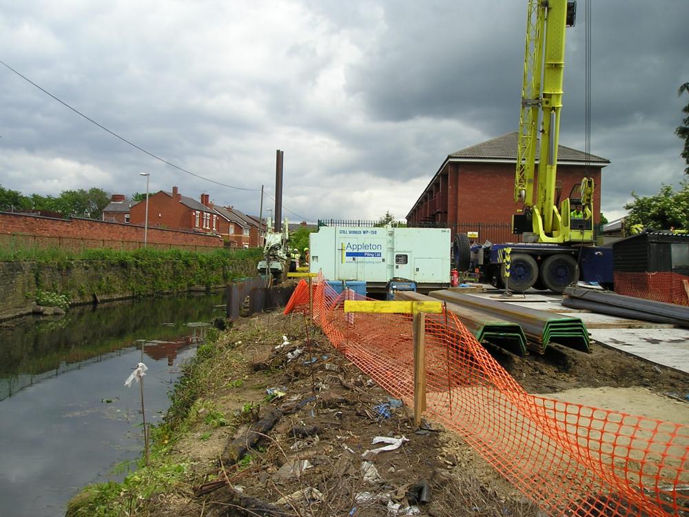 Piling To the bank of the Douglas by Park Street. 12-06-08.