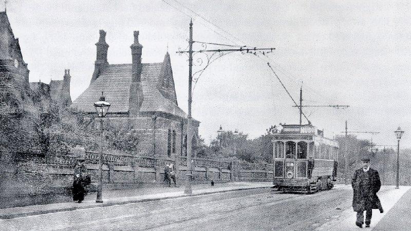 Tram passes Infirmary 