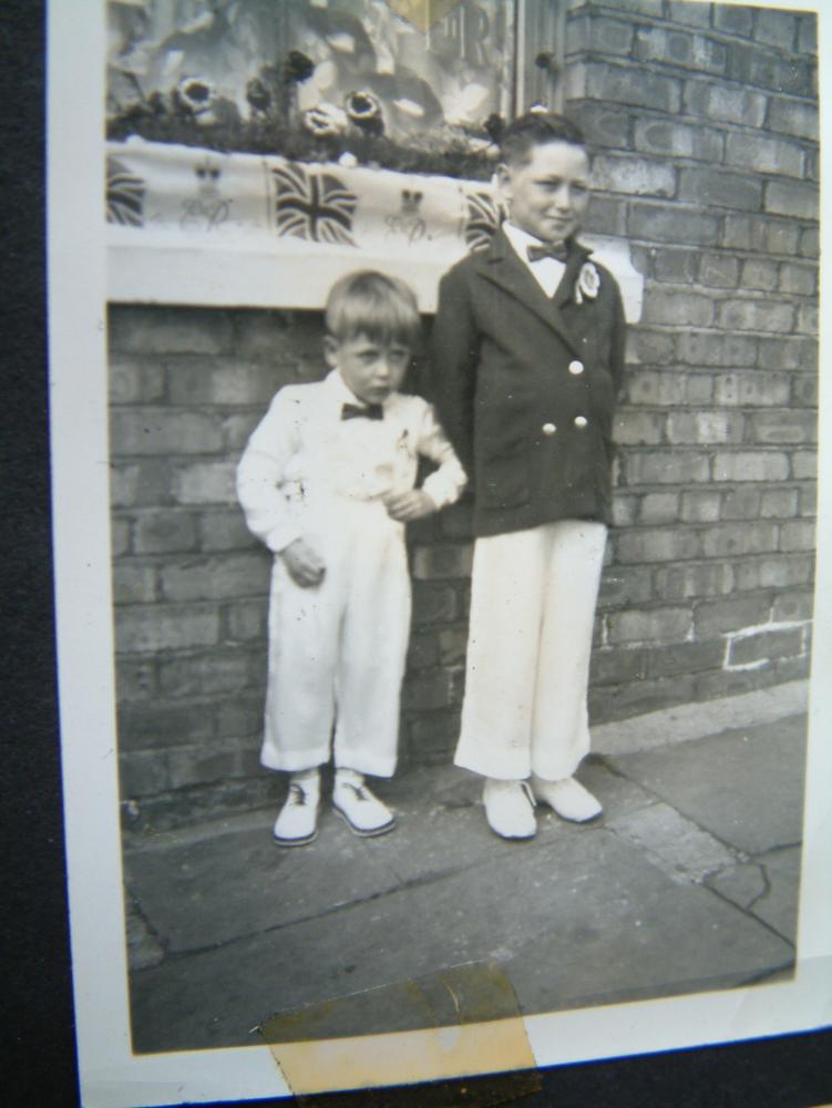 Me and unknown looking smart for the coronation celebration, 1953