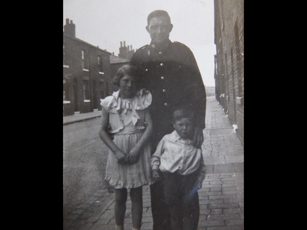 Joseph Cunliffe with daughter Joan and son Norman in School Street Joseph Cunliffe with daughter Joan and son Norman in School Street