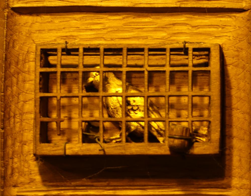 Caged canary, Miners' Screen, St Matthew HIghfield Caged canary, Miners' Screen, St Matthew HIghfield