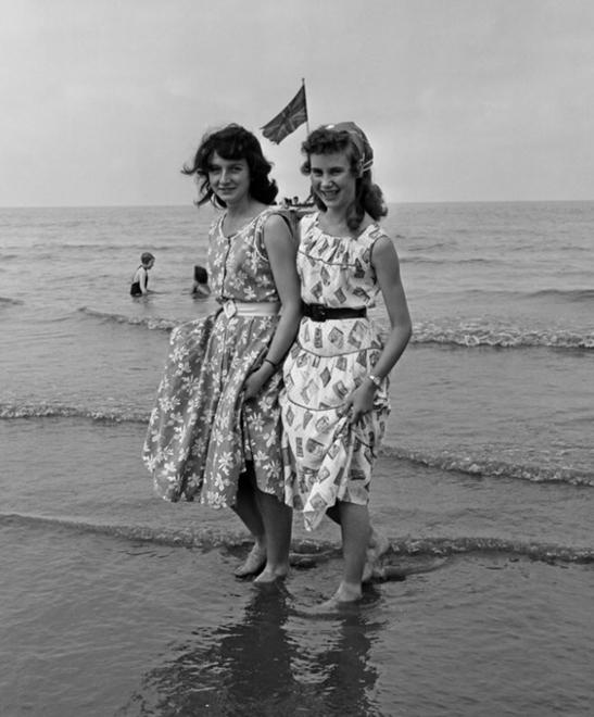 Two Wigan ladies paddling on Blackpool beach. Two Wigan ladies paddling on Blackpool beach.