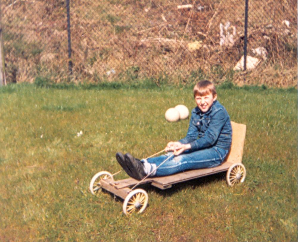 a local urchin aboard a trolley