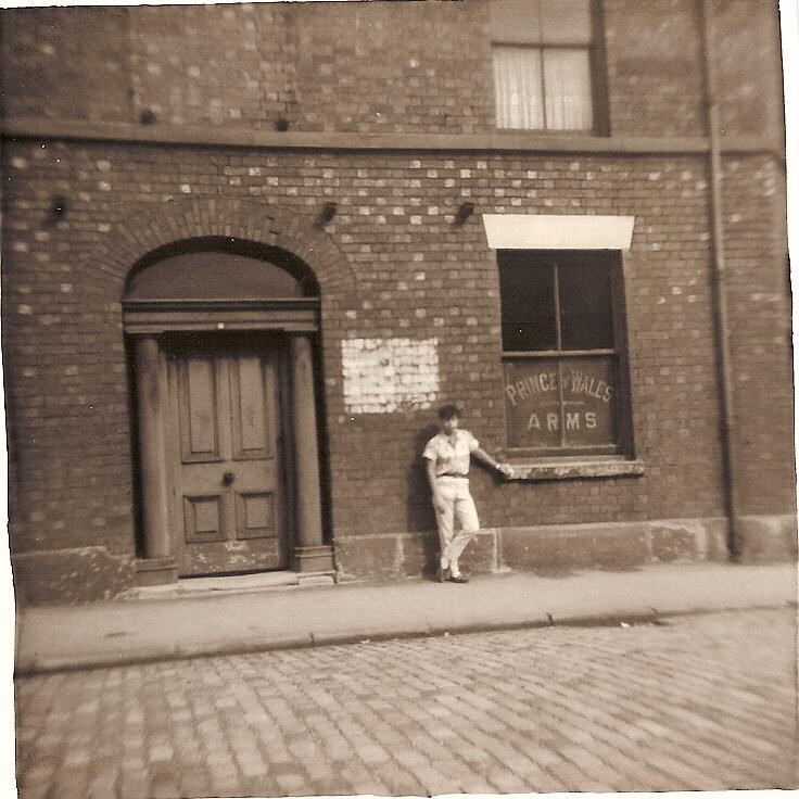 Peter Clegg outsite a pub near Hardybutts, c1958.