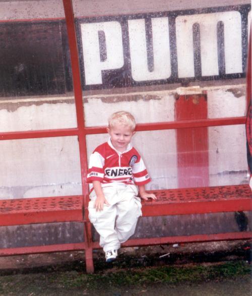 Young fan Lewiss in the dug-out. Young fan Lewiss in the dug-out.