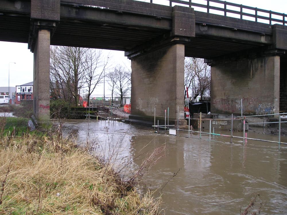 River Douglas in flood by Adam Viaduct