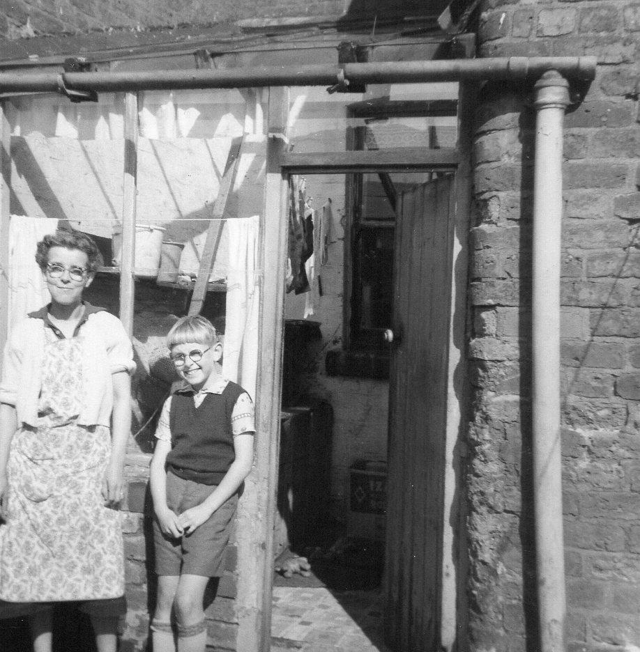 Me and Mum Peggy Hilton ,back yard mill lane aspull 1959 ish