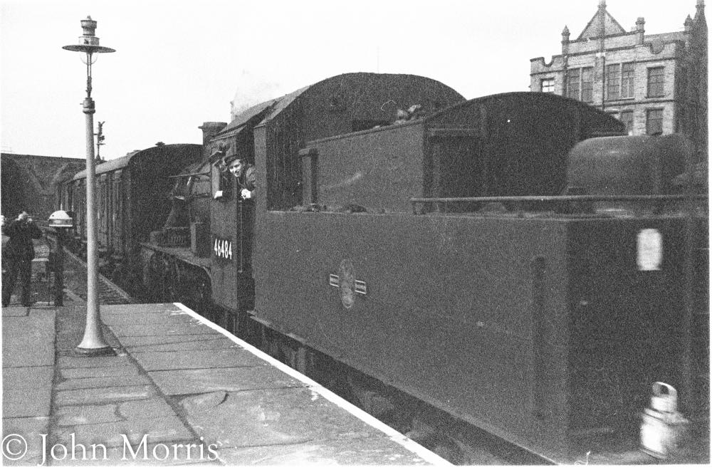 An Ivatt 2mt Mogul passing through Wallgate Station with a short goods train An Ivatt 2mt Mogul passing through Wallgate Station with a short goods train