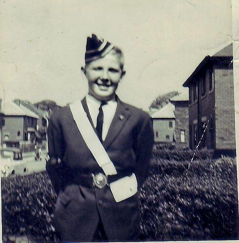 My brother George outside our house in Hawthorn Ave.