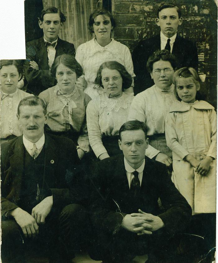 Jane Anne centre seated - with glasses and lace collar.