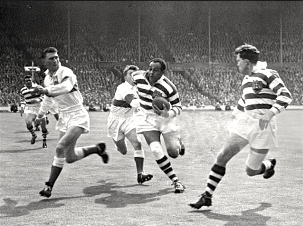Billy Boston on the attack against Workington in the Wembley Final of 1958