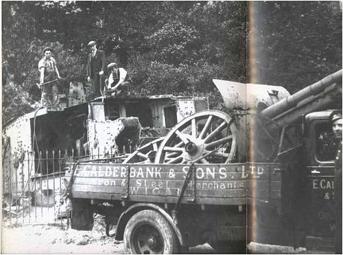World War One Tank and Field Gun being taken for scrap 1930s World War One Tank and Field Gun being taken for scrap 1930s