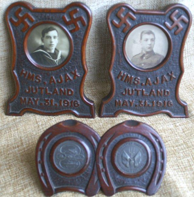 The wooden frames were reported to have been made by a German PoW aboard HMS Ajax. The wooden frames were reported to have been made by a German PoW aboard HMS Ajax.