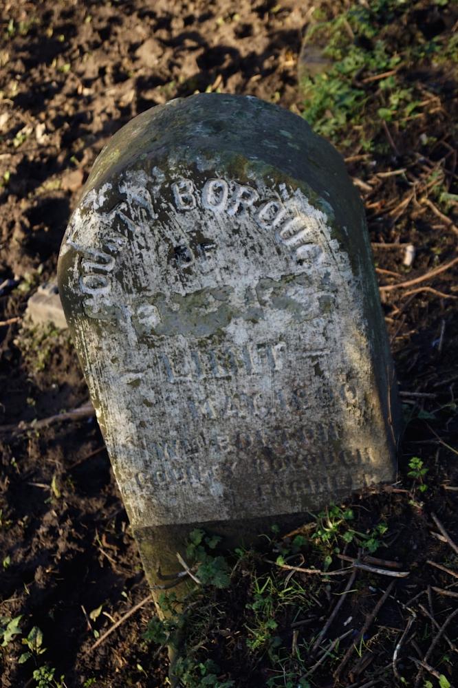 Wigan boundary stone beside the Leeds & Liverpool Canal