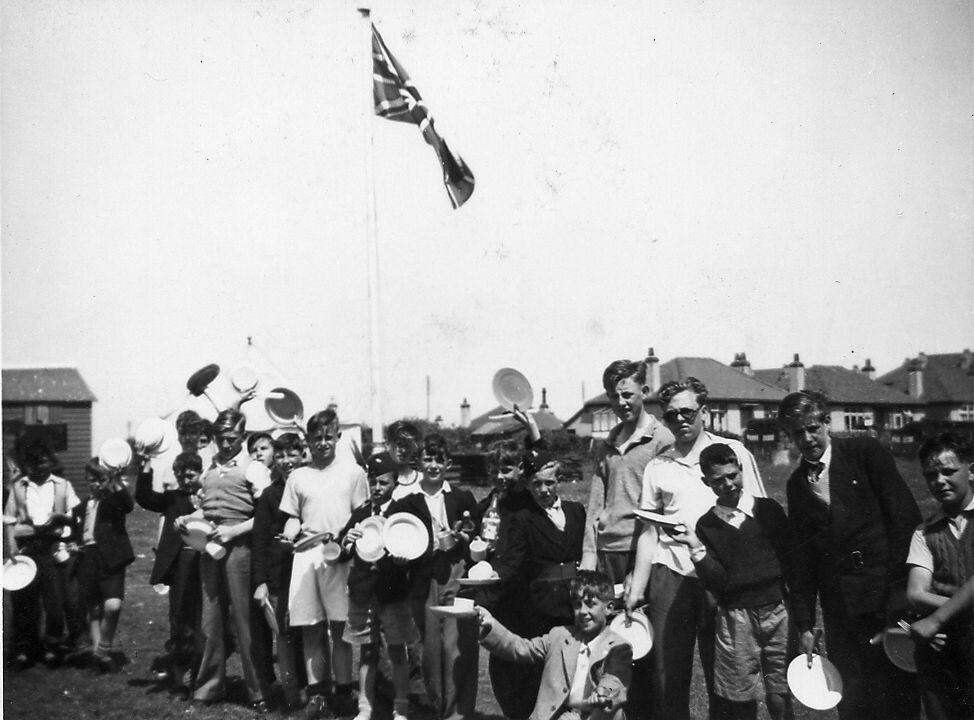 A group of campers queuing up at meal time at Prestatyn Camp.