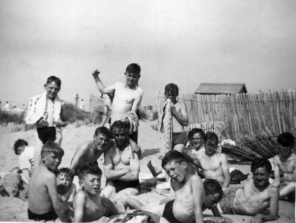 Camp in Prestatyn of campers taking time out with Wally Blakely.